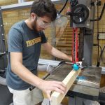 Picture of a student working on a wood project in the Innovation and Collaboration Studio