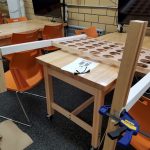 Picture of a wooden project in the process of being made, sitting on a table in the Innovation and Collaboration Studio