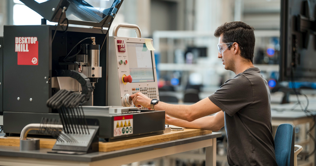 Student using CNC Machine