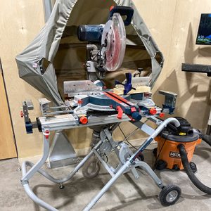 A miter saw on a stand in the Kao Innovation and Collaboration Studio